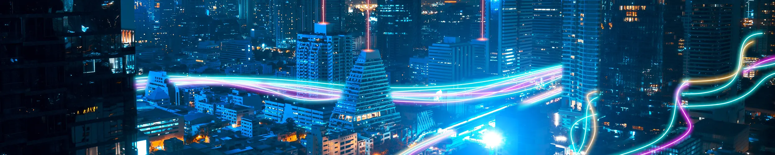 City skyline at night with abstract network connections